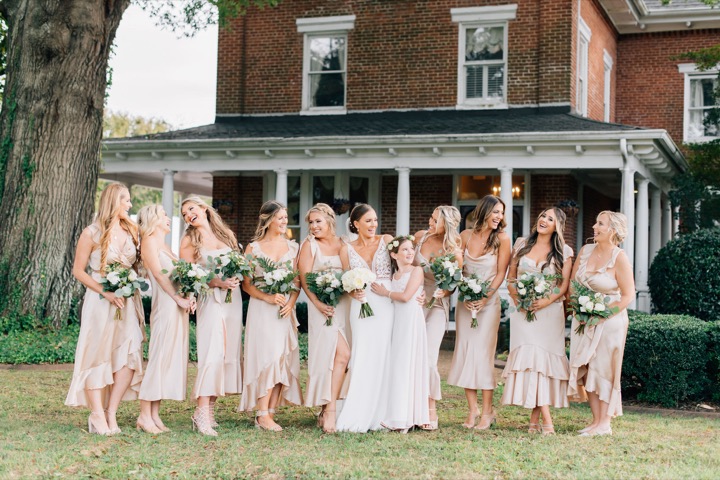 The bridal party standing beneath the oak by the Manor