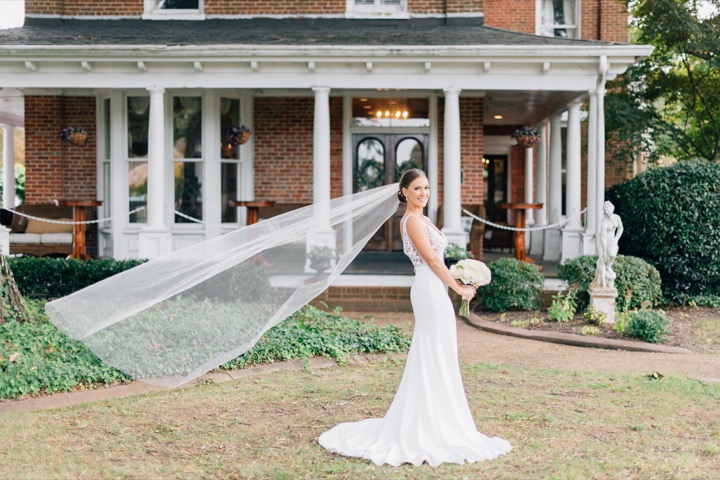 Sarah’s veil stretching across the lawn in front of the Manor