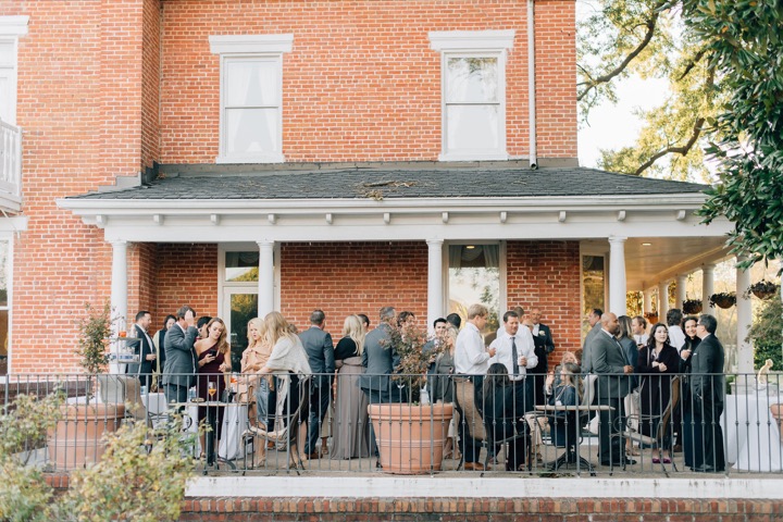 Wedding guests gathered on the Manor porch