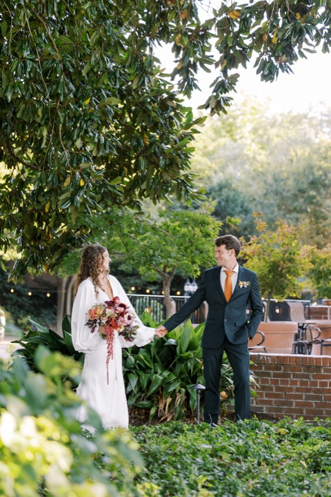 Madelynne and Parker beside the Manor’s garden wall