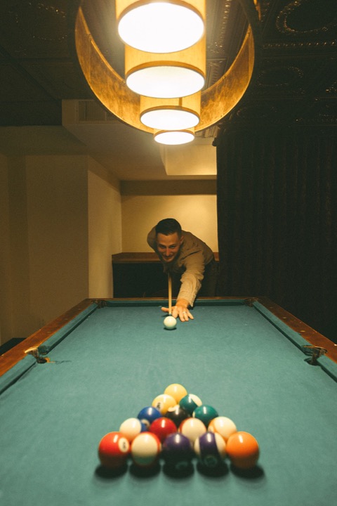 Casey at the billiards table before the celebration