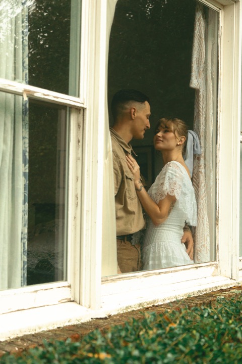 Casey and Kali together beside a Manor window