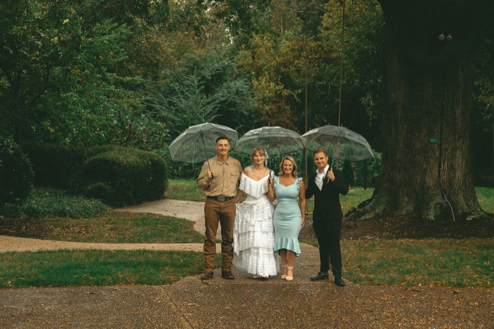 The couple and their family gathered on the garden path