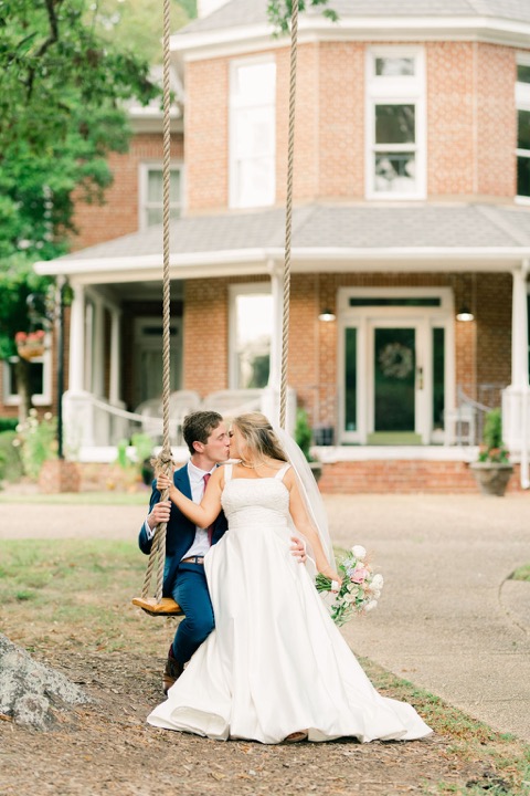 Tyler and Kate on the lawn in front of the Manor