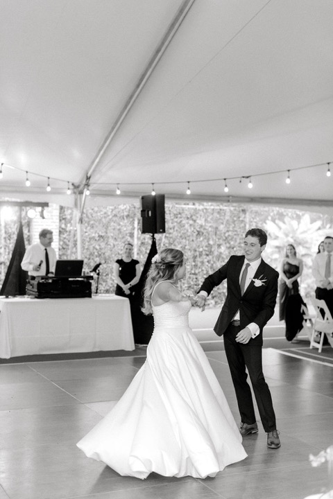 A black-and-white photograph of the first dance