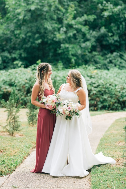 Kate sharing a moment with a member of the bridal party