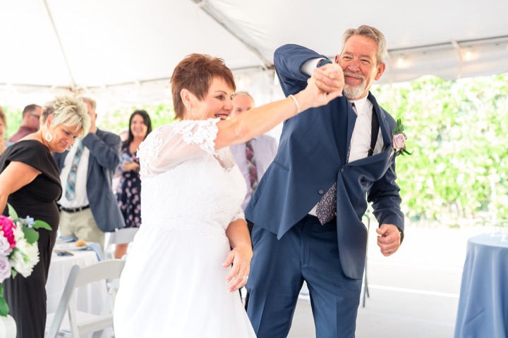 Dave and Leslie raising a toast together