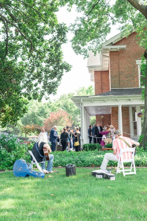 Guests enjoying the lawn beside the Manor porch