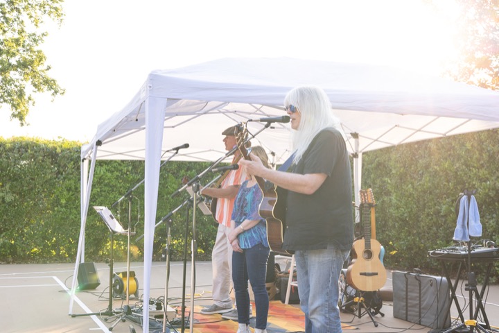 The musicians performing beside the reception tent