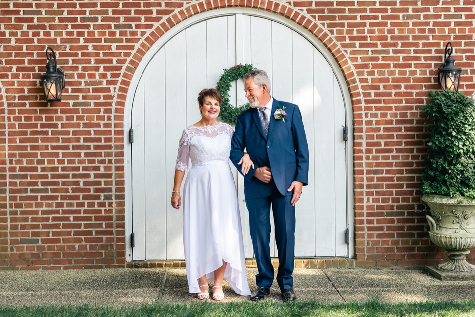 Dave and Leslie together outside the Manor